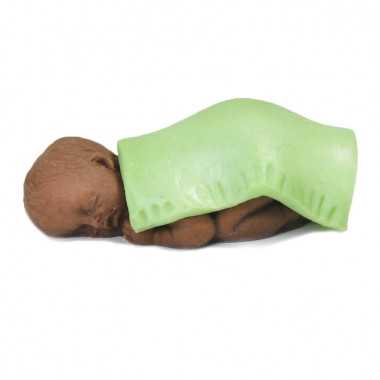 Ciemnoskóre niemowlę pod kocykiem z marcepanu, zielony