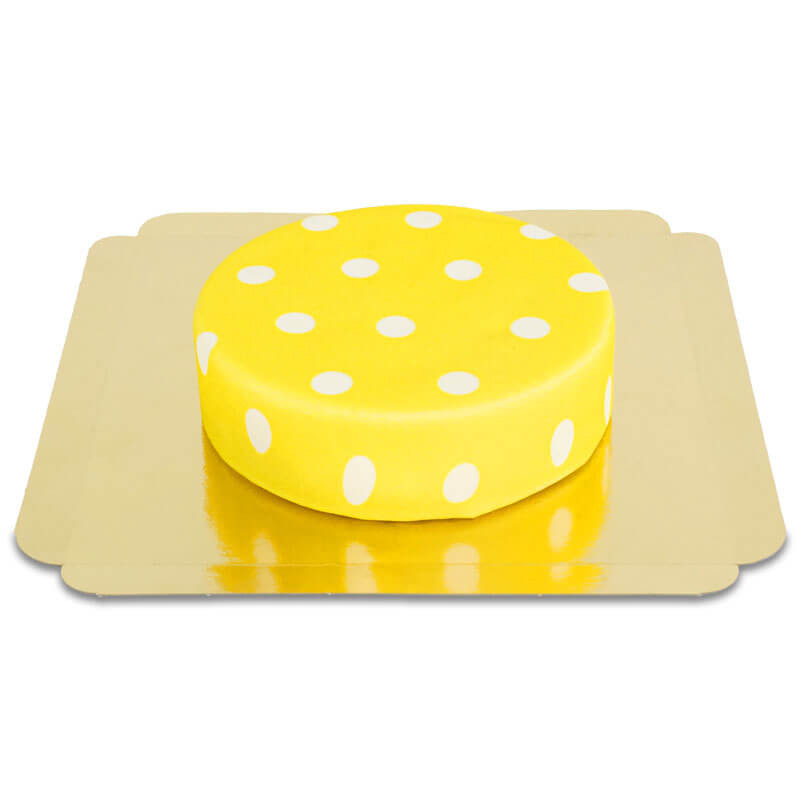 Żółty tort w białe kropki