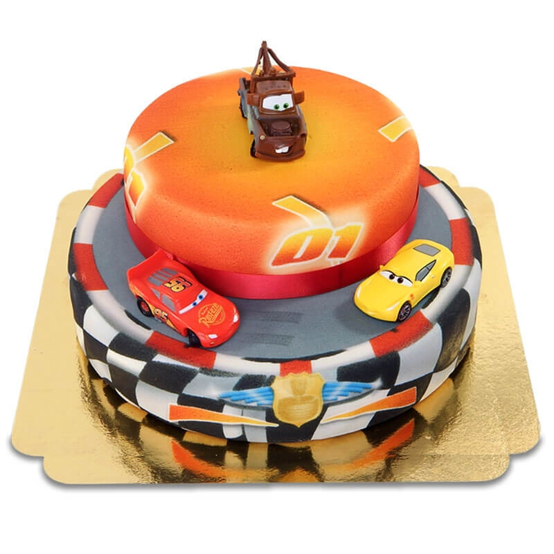 Cars 2 - Lightning McQueen, Francesco Bernoulli und Hook auf zweistöckiger Rennstrecke-Torte mit Band
