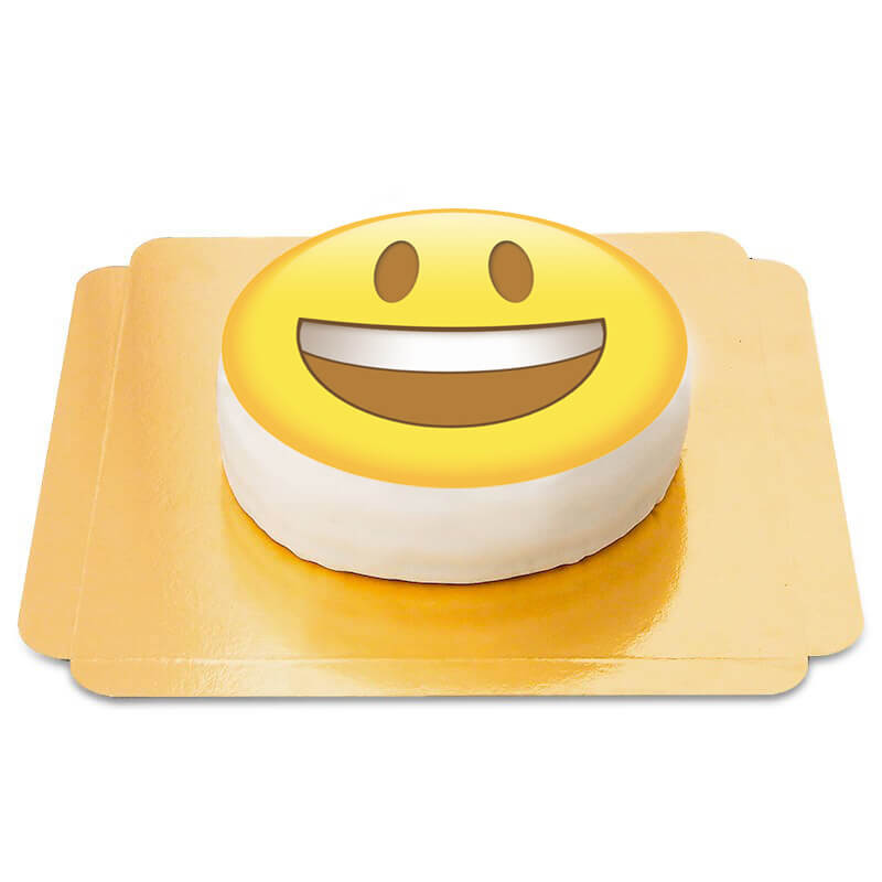 Tort z uśmiechnięta emotikoną 